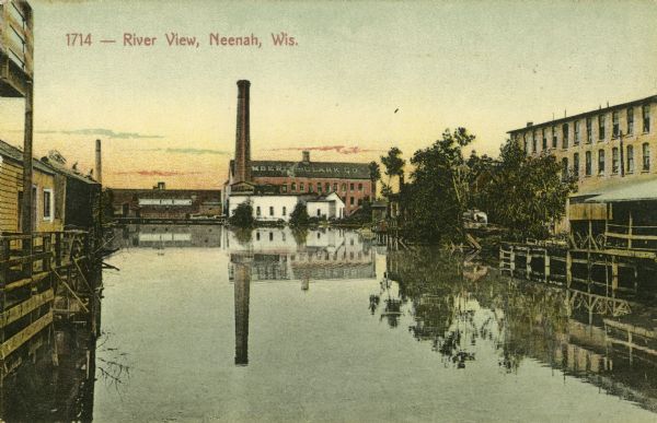 Paper mill, built in 1865-66 and called the Neenah Paper Mill; it was run by a stock copany composed of Nathan Cobb, president; Hiram Smith, secretary and treasurer; Dr. Nathaniel S. Robinson, manager; Edward Smith; John Jamison and Moses Hooper. After the third year of operation, D.C. Van Ostrand purchased interest in it, and he and Hiram Smith rented the mill, calling it Smith & Van Ostrand. Eventually they were able to purchase the rest of the stock and became sole owners. In 1874 Kimberly, Clark & Company bought the mill and incorporated it into their enterprise. Caption reads: "River View, Neenah, Wis."