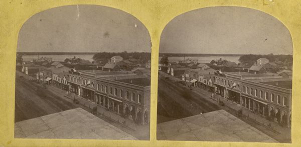 Stereograph of an elevated view of the business district.