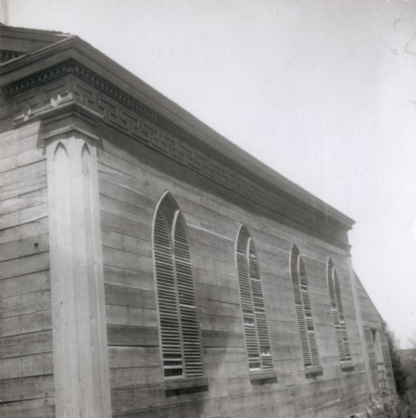 Side view of Mazzuchelli's chapel with windows.
