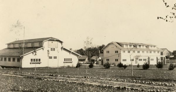 A view of the 7-acre Hallelujah Campground which was located at the corner of Janesville Street and South Perry Parkway in the Village of Oregon. According to "Wisconsin, A Guide to the Badger State" (1941, p.507), this interdenominational, evangelistic institution was founded in 1923 by a former Congregational minister, the Rev. Clement H. "Jack" Linn. By 1941 its facilities included a central building, tabernacle, refectory, small hotel, and several identical cottages (bearing such names as Beulah, Rock of Ages, and Genesis). Revival services were held in the month of August and during the rest of the tourist season the cabins were rented. On Sept 1, 1940 Linn sold 5 acres and most of the buildings to the state organization of the Free Methodist Church. 
