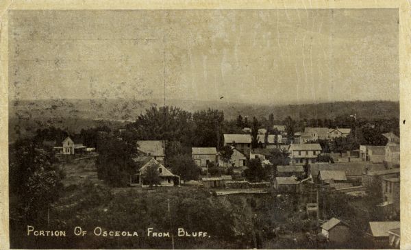 Elevated view of Osceola from the bluff. Caption reads: "Portion of Osceola From Bluff."