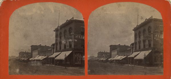 Stereograph of the south side of Main Street.