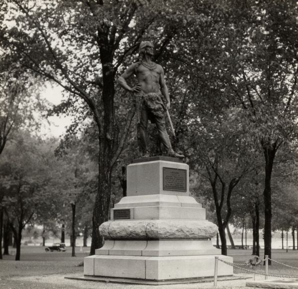Chief Oshkosh's statue and grave. Located in Menominee Park, formerly North Park.