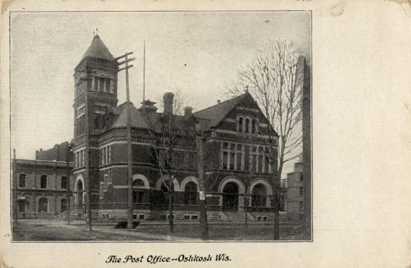 Exterior view of post office. The first post office in Oshkosh was established in the 1840s, and the postmaster was Joseph Jackson. Caption reads: "The Post Office—Oshkosh Wis."
