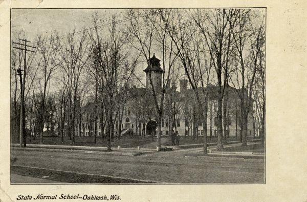 View across street towards the school building. Caption reads: "State Normal School—Oshkosh, Wis." 