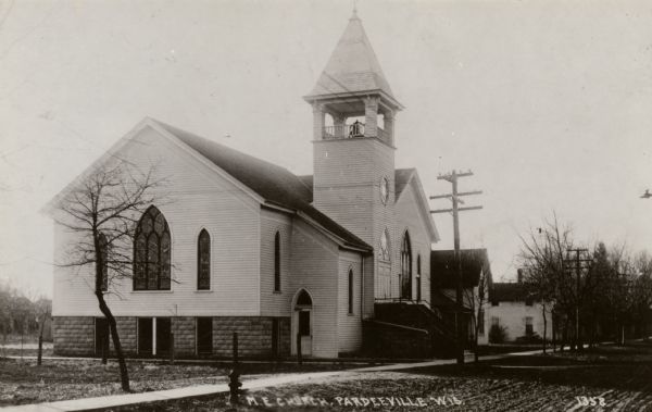 Exterior view of the M. E. Church.