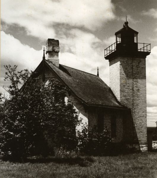 A rear view of the Eagle Harbor Lighthouse at Peninsula State Park.