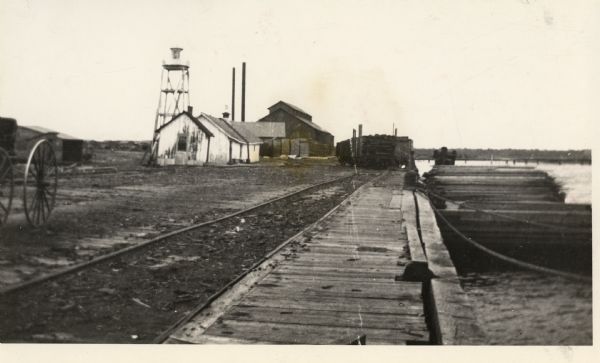 A view of the lighthouse and dock office at Peshtigo Harbor.