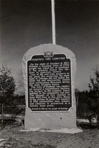 Peshtigo Fire Cemetery marker, shown on the site.
