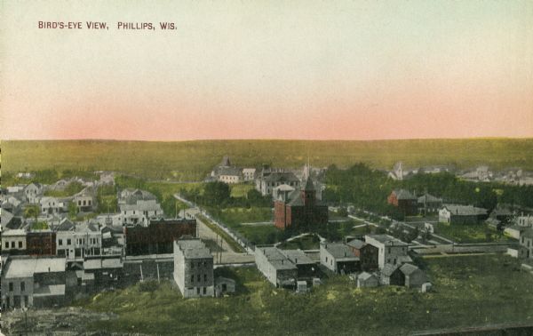 Elevated view of town. Caption reads: "Bird's-Eye View, Phillips, Wis."