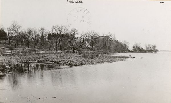 Jacob E. Friend residence showing the main house, barn, bath house, and boat house on Pine Lake.