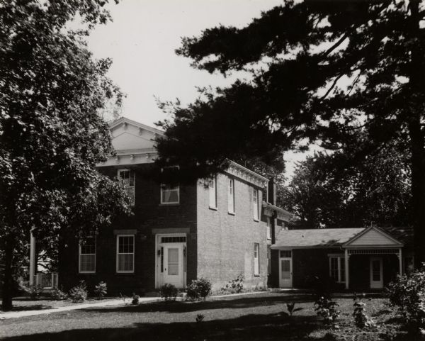 The John H. Rountree House, built in 1854. According to "The History of Wisconsin" (Vol. I, 1973), "The rise of the settlement at Platte Mounds was indissolubly associated with the name of John H. Rountree, the Kentucky-born miner and smelter who laid out the town, represented its people in numerous elective capacities, and with his family helped make the village the center of learning and culture in southwestern Wisconsin." The house was later used as the Wisconsin State College (renamed the University of Wisconsin-Platteville) president's residence.