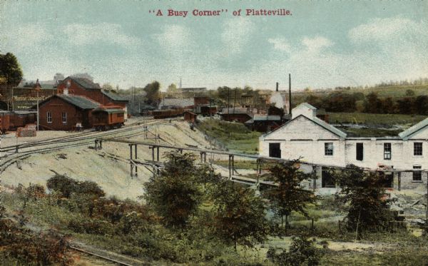 Elevated view of mining operations. Caption reads: "'A Busy Corner' of Platteville."