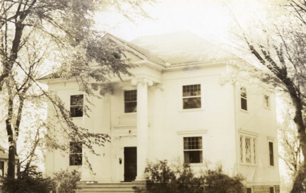 View from the Wisconsin River of the house at 506 W. Edgewater Street, built by Zona Gale in 1906 for her parents after the successful publication of her first novel, Romance Island. Its classical Greek Revival exterior is in contrast to its rustic Craftsman interior. The home was donated to the Women's Civic League in 1932 and was accepted in 1980 for listing on the National Register of Historic Places.