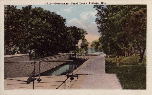 The government canal locks. Caption reads: "Government Canal Locks, Portage, Wis."