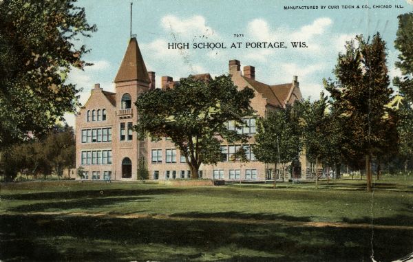 View across grounds toward the high school. Caption reads: "High School at Portage, Wisconsin."