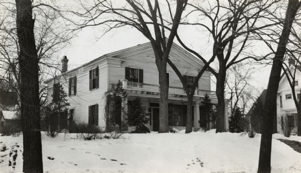 A view of the Henry Merrell house, built about 1833. Snow is on the ground.