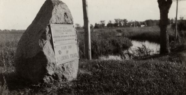 The Pierre Pauquette monument located at the easterm terminus of the Wauona Trail. Erected by the Wau-bun Chapter of the Daughters of the American Revolution, 1925.