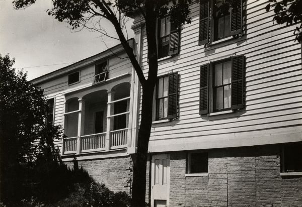 A view of the Blake house showing the detail of the side porch. The house was razed prior to 1952.