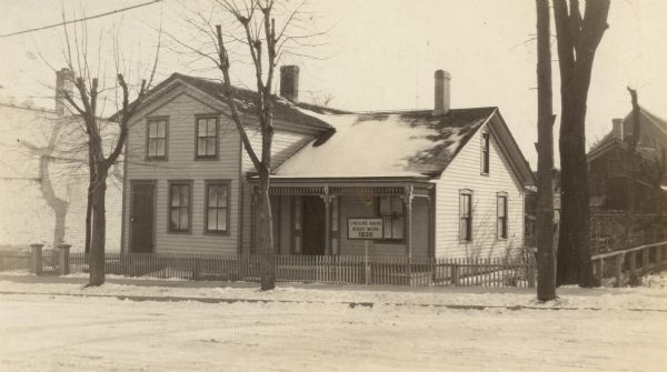 "Gen." Wooster Harrison house. Sign in front reads, "Lincolns Abode/West Wing/1835".