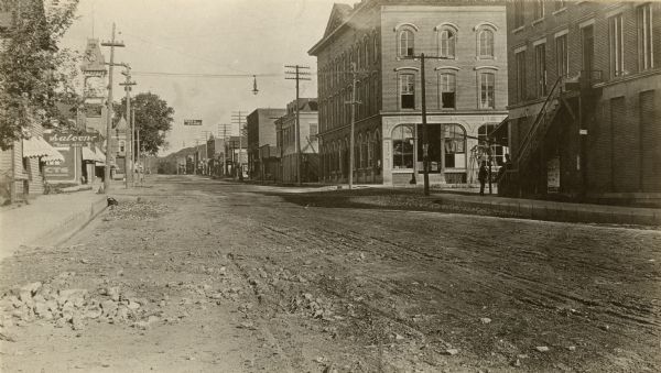 Bluff Street looking east. Pencil notation on this photograph reads: "House marked X is my home and is said to be built from stone from Fort Crawford. -A.C."