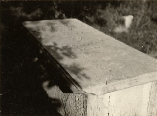 View of the top of the Brisbois grave, tomb of Michael Brisbois.