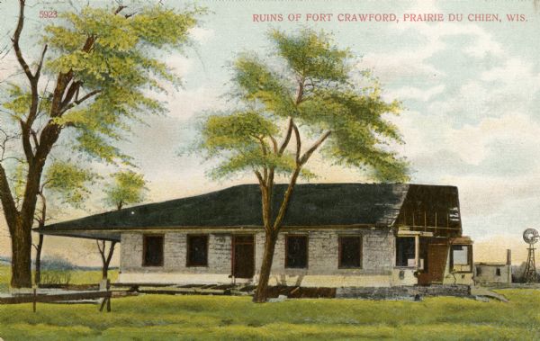 Ruins of Fort Crawford. A windmill is in the background on the right. Caption reads: "Ruins of Fort Crawford, Prairie du Chien, Wis."