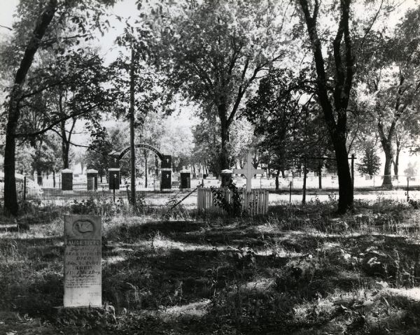 French Cemetery, showing grave of Alice Irene Shoemaker who died in January of 1862. Calvary Cemetery is in the background.