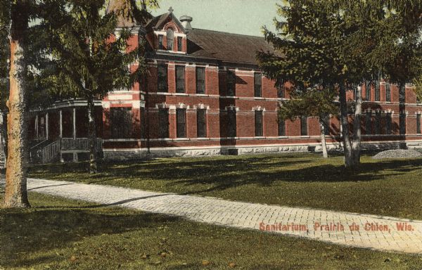 Exterior view of the Praire du Chien Sanitarium. Caption reads: "Sanitarium, Prairie du Chien, Wis."