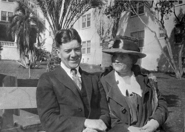 Snapshot of Robert M. La Follette, Jr., and Belle Case La Follette seated on a bench during a California vacation.  They made this trip without Robert M. La Follette, Sr., because of Bob Jr.'s illness.
