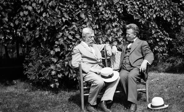 Senator Robert M. La Follette, Sr., at Maple Bluff Farm in 1909.  Seated with him on the bench is Madison physician, Dr. Philip Fox, a close family friend, the La Follette family physician, and the man after whom Philip Fox La Follette was named.  Dr. Fox was a surgeon with the 2nd Wisconsin Infantry during the Civil War, and he began his Madison practice in 1865.