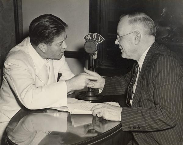 Senator Robert M. La Follette, Jr., and William Green, president of the American Federation of Labor, debate a point during a Mutual Broadcasting System radio program. La Follette had a reputation as a friend of labor unions, built primarily on his investigation of the methods labor opponents had used to prevent unions from organizing. By the time of his 1946 re-election campaign, however, Wisconsin labor had shifted its allegiance to the growing state Democratic Party. Their decision to vote for the unopposed Democratic candidate in the primary election, rather than La Follette who was running in the Republican primary, was a decisive factor in the election of La Follette's opponent, Joseph R. McCarthy.