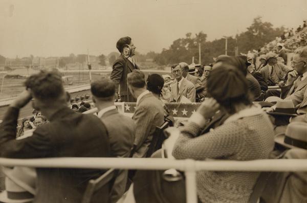 Governor Philip F. La Follette, the younger son of Senator Robert M. La Follette, Sr., addressing a crowd in the grandstand at the Wisconsin State Fair in West Allis.