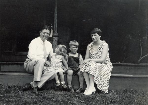 Senator Robert M. La Follette, Jr., on the porch at Maple Bluff Farm with his wife and two of his brother's children, Judy and Robert M. La Follette, III. La Follette was elected to the Senate following the death of his father, Robert M. La Follette, Sr., in 1925. This photograph was taken at about the time of Senator La Follette's marriage to Rachel Young.