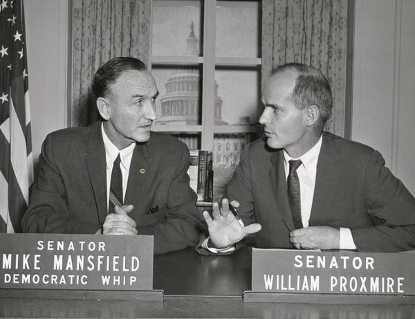 Senator William Proxmire of Wisconsin, and Senator Mike Mansfield of Montana, on the set of the Senate Recording Studio in Washington, D.C. From his first years in the Senate, Proxmire made good use of the media, broadcasting radio and television news programs and interviews such as this to his constituents in Wisconsin.