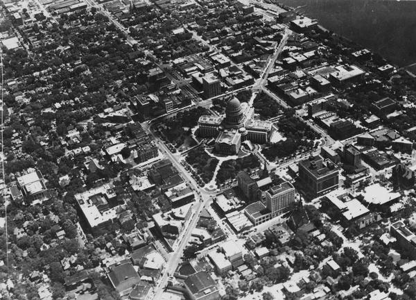 Aerial view of Capitol Square and vicinity, looking east-northeast.  State Street is visible at the bottom center.
