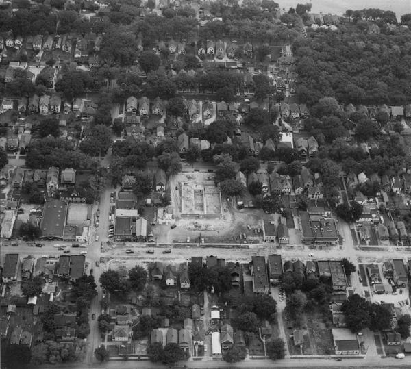 Aerial view looking southeast over Madison's near east side. The Eagles Club at 1236 Jenifer Street / 1221 Williamson Street is under construction in the center. The site had been the location of Marquette School.