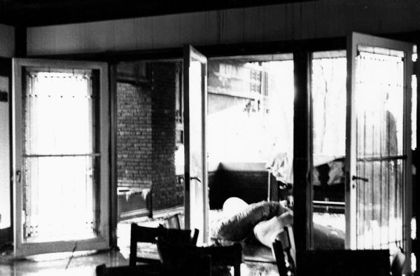 The interior back porch doors of the Bradley House after the fire of March 17.
