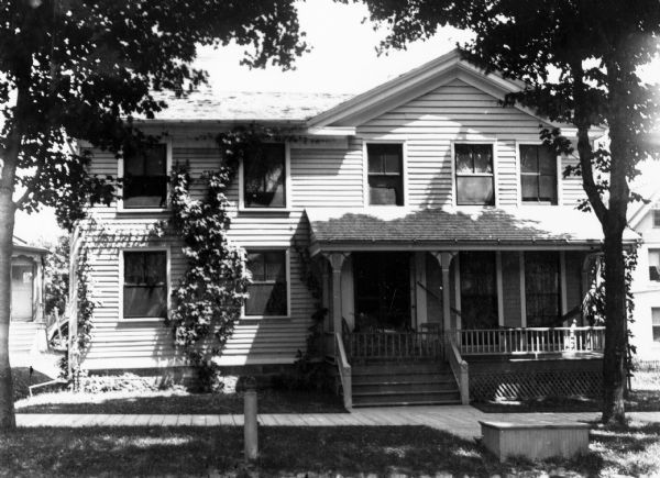 Frederick King Conover residence, located at 309 North Pinckney Street.  In 1908 the house was moved by William Miller to 647 East Dayton Street.  It has subsequently been designated as a Madison Landmark.