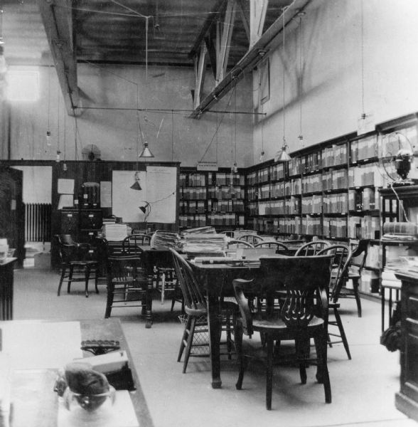 Temporary quarters of the Legislative Reference Library in the fourth floor of the South Wing of the present Capitol.  LRB later (ca. 1914-1917) moved to the North Wing after its completion.