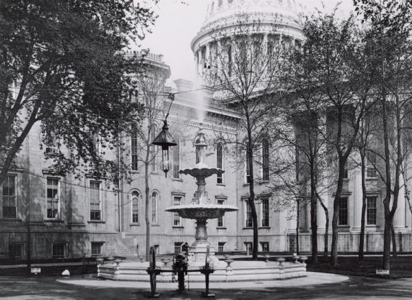 A replica of a fountain from the Philadelphia Centennial Exposition that was installed in the Capitol Park near the East Wing of the second capitol in Madison in 1878.
