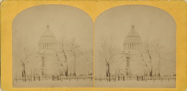 A stereograph of the Wisconsin State Capitol in the winter.
