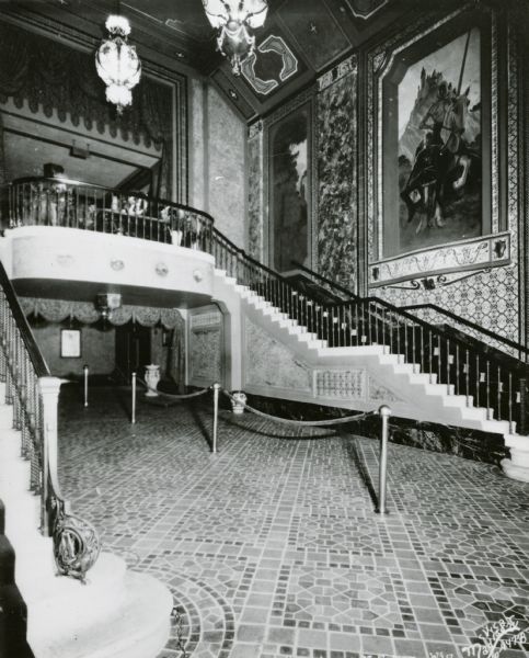Interior view of the Capitol Theatre's entrance flanked with staircases.
