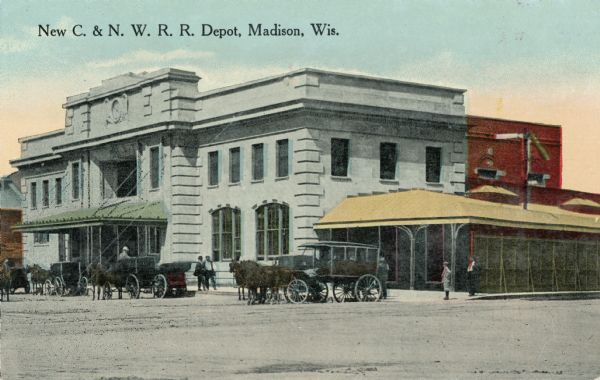 View across street toward the Chicago & Northwestern Railroad Depot. Caption reads: "New C. & N. W. R. R. Depot, Madison, Wis."