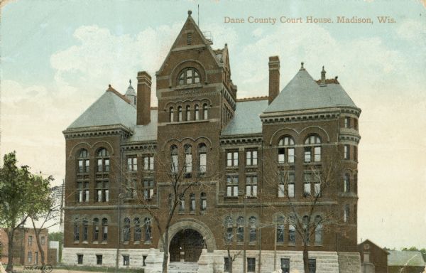 Exterior of the Dane County Courthouse, 207 W. Main Street. Caption reads: "Dane County Courthouse, Madison, Wis."