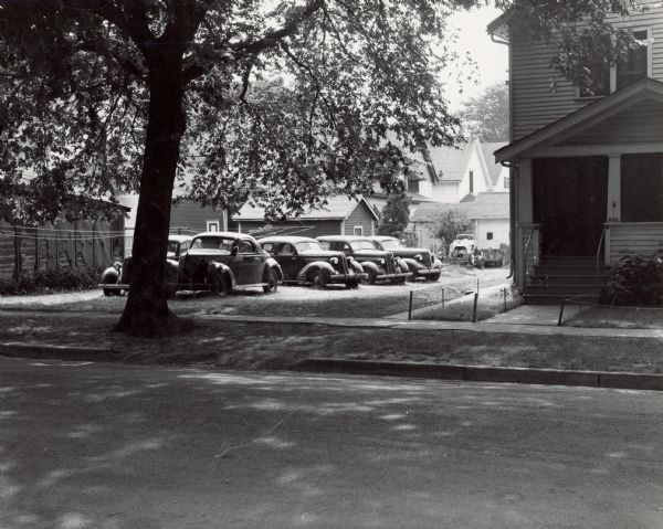 Cars parked at 943-945 East Dayton Street.