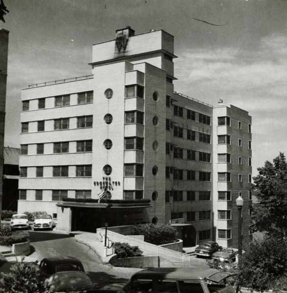 The Edgewater Hotel, 666 Wisconsin Avenue.  The original wing was in the moderne style by architect Lawrence Monberg and built for the Quisling family in 1946.  Other local examples of this building style designed by Monberg include the Quisling Clinic at 2 West Gorham Street and the Quisling Towers apartments at 1 East Gilman Street.