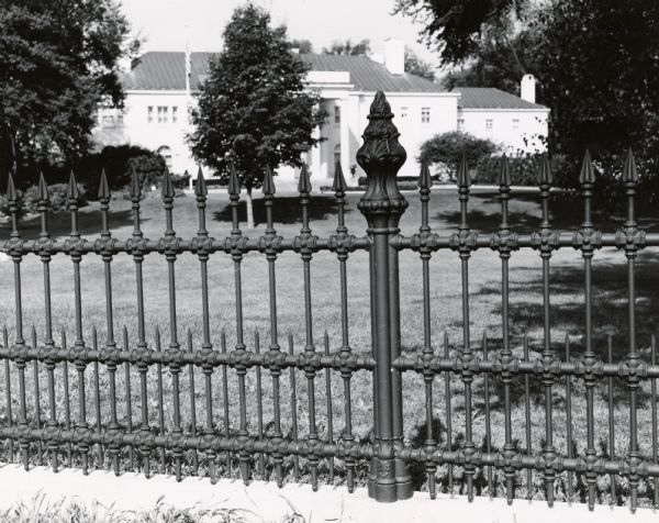 The Executive Residence in Maple Bluff. The fence, erected in 1872, originally surrounded the Capitol.