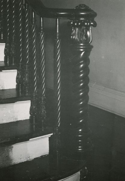 The Executive Residence, 130 East Gilman Street, showing a detail of the newel post and spindles of the stairway.