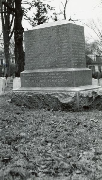 A monument to dead Confederate soldiers and Mrs. Alice W. Waterman at the entrance to "Confederate Rest" in the Forest Hill Cemetery.  This monument was erected by the United Daughters of the Confederacy.